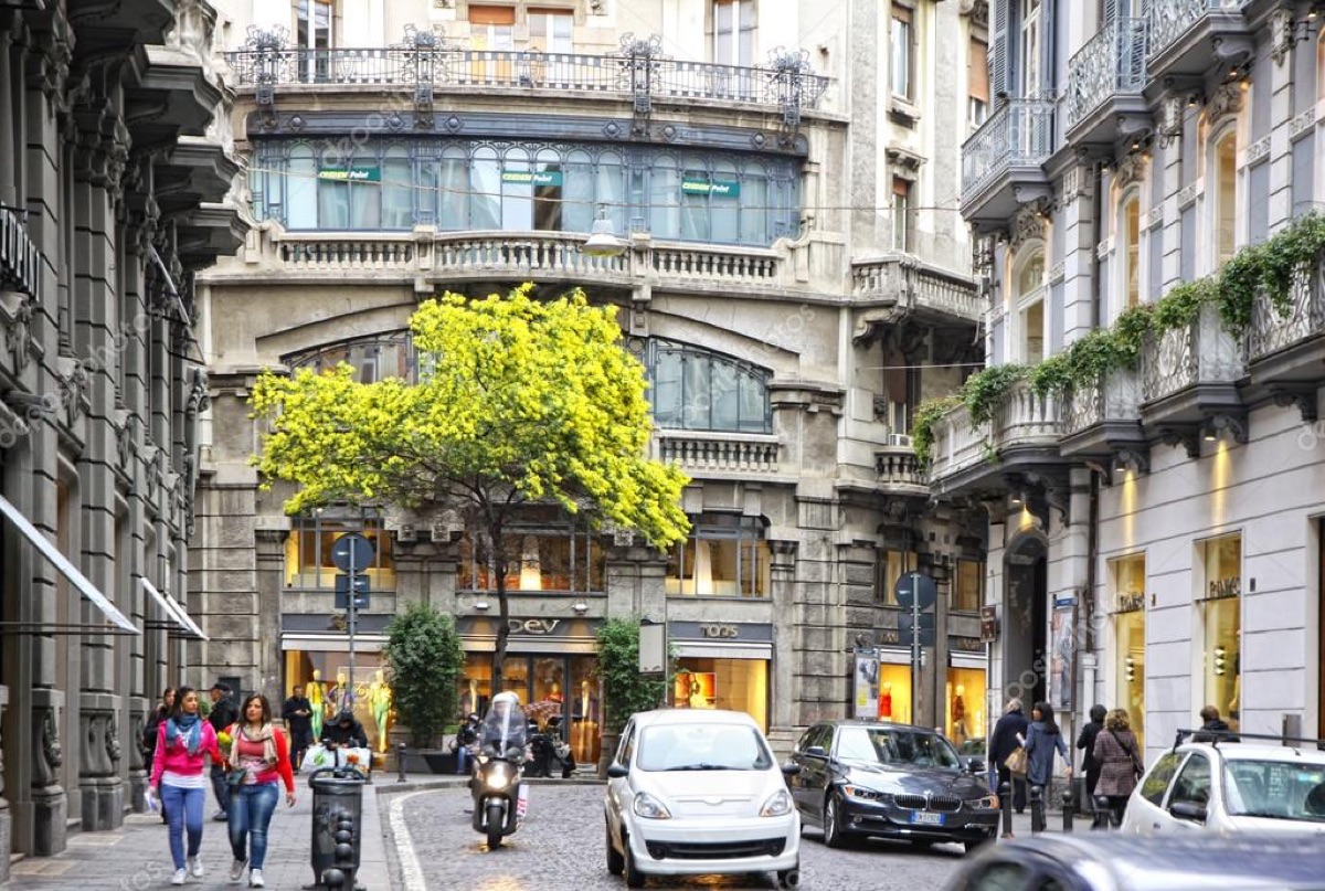A street in Chiaia with elegant buildings and shops
